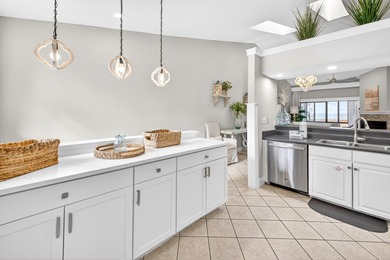 STUNNING UPSTAIRS CONDO WITH SWEEPING BAY & MARINA VIEWS IN on Sandestin Golf and Beach Resort - The Links in Florida - for sale on GolfHomes.com, golf home, golf lot