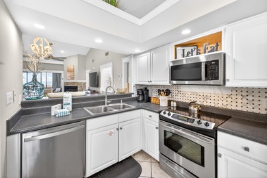 STUNNING UPSTAIRS CONDO WITH SWEEPING BAY & MARINA VIEWS IN on Sandestin Golf and Beach Resort - The Links in Florida - for sale on GolfHomes.com, golf home, golf lot