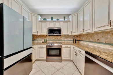 This amazing two-bedroom two bath plus den villa is sure to on River Strand Golf and Country Club At Heritage Harbour  in Florida - for sale on GolfHomes.com, golf home, golf lot