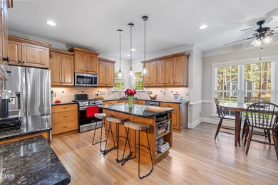 5BR / 4BA on Corner Lot with Double Porches, Screened Porch & on Heritage Golf Club in North Carolina - for sale on GolfHomes.com, golf home, golf lot