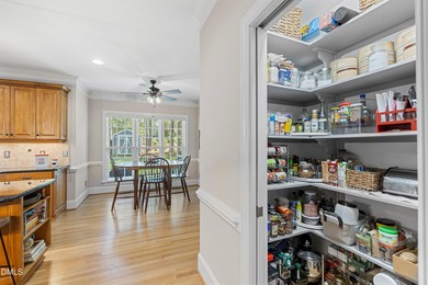 5BR / 4BA on Corner Lot with Double Porches, Screened Porch & on Heritage Golf Club in North Carolina - for sale on GolfHomes.com, golf home, golf lot