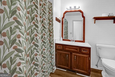 Welcome to this beautifully maintained four-bedroom, two-bath on Golf Club of Macon in Georgia - for sale on GolfHomes.com, golf home, golf lot