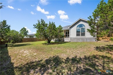 Enjoy the quiet and luxury of Lago Vista in this like-new Aria on Highland Lakes Golf Course in Texas - for sale on GolfHomes.com, golf home, golf lot