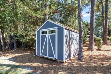 5BR / 4BA on Corner Lot with Double Porches, Screened Porch & on Heritage Golf Club in North Carolina - for sale on GolfHomes.com, golf home, golf lot