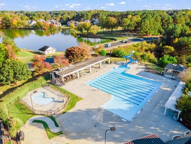 5BR / 4BA on Corner Lot with Double Porches, Screened Porch & on Heritage Golf Club in North Carolina - for sale on GolfHomes.com, golf home, golf lot