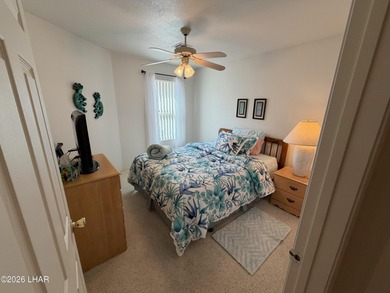 Welcome to this beautifully maintained 2 bedroom, 2 bathroom, 2 on London Bridge Golf Course in Arizona - for sale on GolfHomes.com, golf home, golf lot