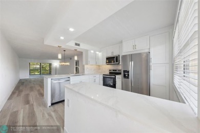This is it! The most stunning unit in Wynmoor! Overlooking on Wynmoor Golf Course in Florida - for sale on GolfHomes.com, golf home, golf lot
