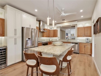 This masterpiece of elegance and comfort, perched on the 9th on Kensington Golf and Country Club in Florida - for sale on GolfHomes.com, golf home, golf lot