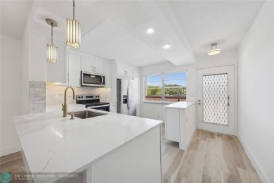 This is it! The most stunning unit in Wynmoor! Overlooking on Wynmoor Golf Course in Florida - for sale on GolfHomes.com, golf home, golf lot