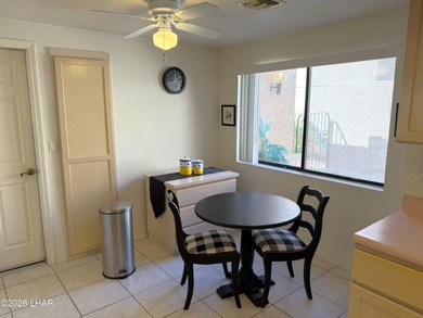 Welcome to this beautifully maintained 2 bedroom, 2 bathroom, 2 on London Bridge Golf Course in Arizona - for sale on GolfHomes.com, golf home, golf lot