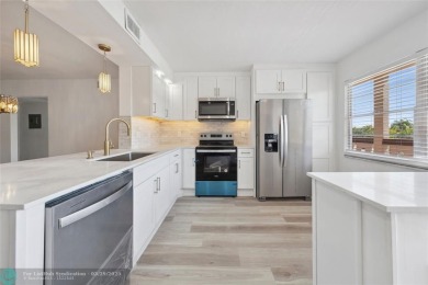 This is it! The most stunning unit in Wynmoor! Overlooking on Wynmoor Golf Course in Florida - for sale on GolfHomes.com, golf home, golf lot