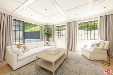 Experience unparalleled luxury at this magnificent English Manor on Bel-Air Country Club in California - for sale on GolfHomes.com, golf home, golf lot