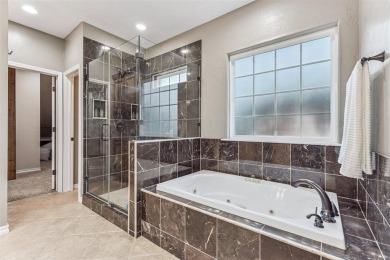 Discover this impressive 4-5 bedroom, 4 full bath home on an on Elks Country Club in Oklahoma - for sale on GolfHomes.com, golf home, golf lot