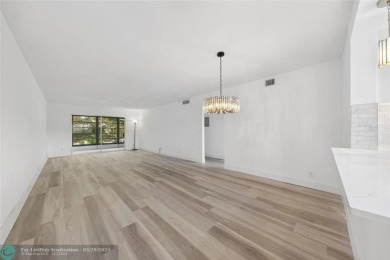 This is it! The most stunning unit in Wynmoor! Overlooking on Wynmoor Golf Course in Florida - for sale on GolfHomes.com, golf home, golf lot
