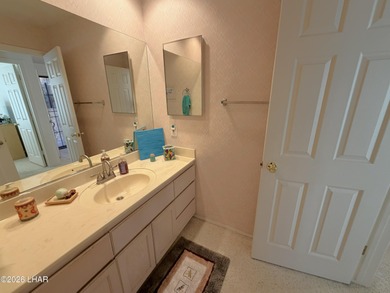 Welcome to this beautifully maintained 2 bedroom, 2 bathroom, 2 on London Bridge Golf Course in Arizona - for sale on GolfHomes.com, golf home, golf lot