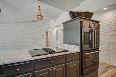 Sprawling transitional 5300 sq ft home on just under an acre on Cavalier Golf and Yacht Club in Virginia - for sale on GolfHomes.com, golf home, golf lot