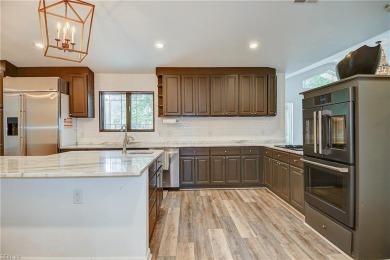 Sprawling transitional 5300 sq ft home on just under an acre on Cavalier Golf and Yacht Club in Virginia - for sale on GolfHomes.com, golf home, golf lot