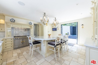 Experience unparalleled luxury at this magnificent English Manor on Bel-Air Country Club in California - for sale on GolfHomes.com, golf home, golf lot