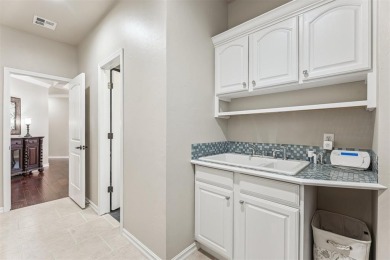 Discover this impressive 4-5 bedroom, 4 full bath home on an on Elks Country Club in Oklahoma - for sale on GolfHomes.com, golf home, golf lot