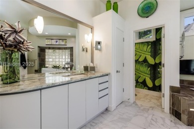 This stunning custom home, set on a premier homesite in the on Colleton River Plantation Club in South Carolina - for sale on GolfHomes.com, golf home, golf lot