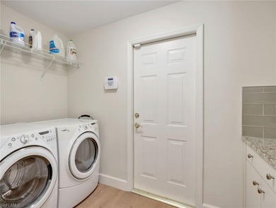 This masterpiece of elegance and comfort, perched on the 9th on Kensington Golf and Country Club in Florida - for sale on GolfHomes.com, golf home, golf lot