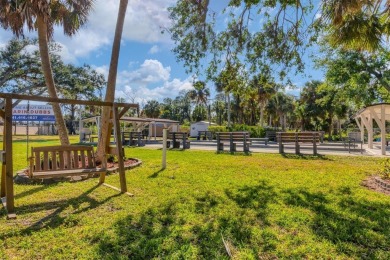 Lovely, Updated, 2/2 DW Mobile Home in Alameda Isles. Home on Boca Royale Golf and Country Club in Florida - for sale on GolfHomes.com, golf home, golf lot