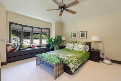 This stunning custom home, set on a premier homesite in the on Colleton River Plantation Club in South Carolina - for sale on GolfHomes.com, golf home, golf lot
