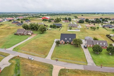 Discover this impressive 4-5 bedroom, 4 full bath home on an on Elks Country Club in Oklahoma - for sale on GolfHomes.com, golf home, golf lot