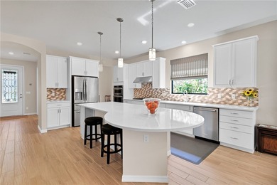 Who says you can't have your cake & eat it, too; this home HAS on Bent Pine Golf Club in Florida - for sale on GolfHomes.com, golf home, golf lot