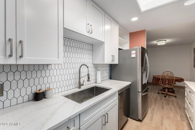 Don't miss the chance to own this beautifully updated 2-bedroom on Sun Village Golf Course in Arizona - for sale on GolfHomes.com, golf home, golf lot