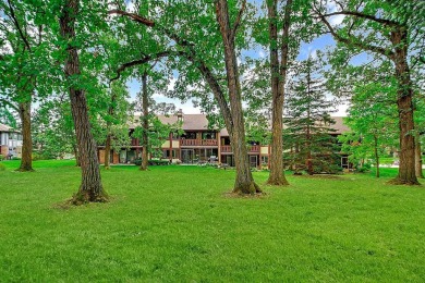 Discover the charm of this exceptionally spacious second-floor on Oak Hills Country Club in Illinois - for sale on GolfHomes.com, golf home, golf lot