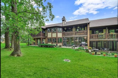 Discover the charm of this exceptionally spacious second-floor on Oak Hills Country Club in Illinois - for sale on GolfHomes.com, golf home, golf lot