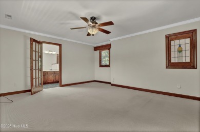 Charming 3-bedroom plus office, 2-bathroom home located in the on Olde Point Golf and Country Club in North Carolina - for sale on GolfHomes.com, golf home, golf lot