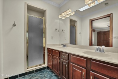 Charming 3-bedroom plus office, 2-bathroom home located in the on Olde Point Golf and Country Club in North Carolina - for sale on GolfHomes.com, golf home, golf lot