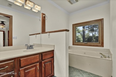 Charming 3-bedroom plus office, 2-bathroom home located in the on Olde Point Golf and Country Club in North Carolina - for sale on GolfHomes.com, golf home, golf lot