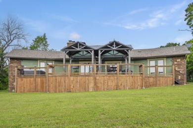 The ultimate vacation retreat awaits! Escape to 12 Woodland Dr on Kimberling City Golf Club in Missouri - for sale on GolfHomes.com, golf home, golf lot