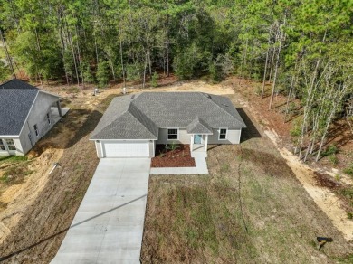 Welcome to your dream home in the sought-after Williston on Williston Highlands Golf and Country Club in Florida - for sale on GolfHomes.com, golf home, golf lot