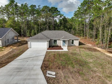Welcome to your dream home in the sought-after Williston on Williston Highlands Golf and Country Club in Florida - for sale on GolfHomes.com, golf home, golf lot
