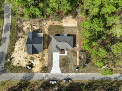 Welcome to your dream home in the sought-after Williston on Williston Highlands Golf and Country Club in Florida - for sale on GolfHomes.com, golf home, golf lot