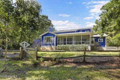 Charming 3-bedroom plus office, 2-bathroom home located in the on Olde Point Golf and Country Club in North Carolina - for sale on GolfHomes.com, golf home, golf lot