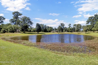Charming 3-bedroom plus office, 2-bathroom home located in the on Olde Point Golf and Country Club in North Carolina - for sale on GolfHomes.com, golf home, golf lot