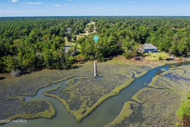 Charming 3-bedroom plus office, 2-bathroom home located in the on Olde Point Golf and Country Club in North Carolina - for sale on GolfHomes.com, golf home, golf lot