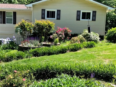 Welcome to this charming and uniquely designed 4-bedroom home in on The Trail At Chickasaw Pointe in South Carolina - for sale on GolfHomes.com, golf home, golf lot