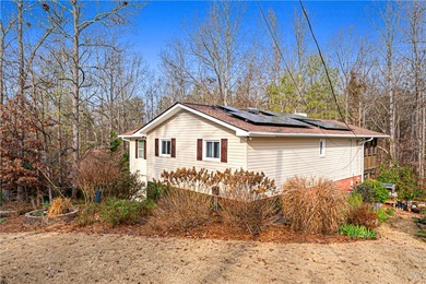 Welcome to this charming and uniquely designed 4-bedroom home in on The Trail At Chickasaw Pointe in South Carolina - for sale on GolfHomes.com, golf home, golf lot