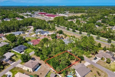 Build your dream home on this beautiful vacant lot in the on The Grand Club - Pine Lakes Course in Florida - for sale on GolfHomes.com, golf home, golf lot