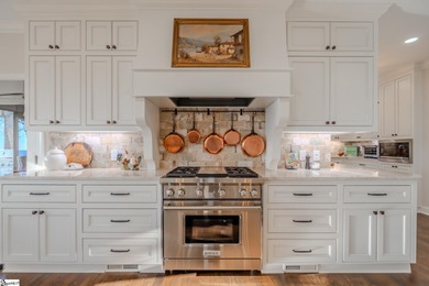 From the first step inside, this 3,334 SF home reveals itself as on The Cliffs at Glassy Golf and Country Club in South Carolina - for sale on GolfHomes.com, golf home, golf lot