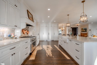 From the first step inside, this 3,334 SF home reveals itself as on The Cliffs at Glassy Golf and Country Club in South Carolina - for sale on GolfHomes.com, golf home, golf lot