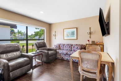 Located in the prestigious Boca Woods Country Club, this updated on Boca Woods Country Club in Florida - for sale on GolfHomes.com, golf home, golf lot