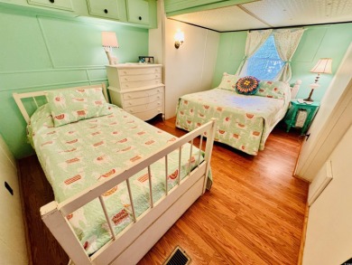 ADORABLE AND VERY SPACIOUS 3 BED/2 BATH BEACH BUNGALOW LOCATED on Prestwick Country Club in South Carolina - for sale on GolfHomes.com, golf home, golf lot