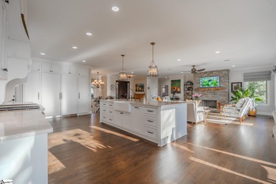 From the first step inside, this 3,334 SF home reveals itself as on The Cliffs at Glassy Golf and Country Club in South Carolina - for sale on GolfHomes.com, golf home, golf lot